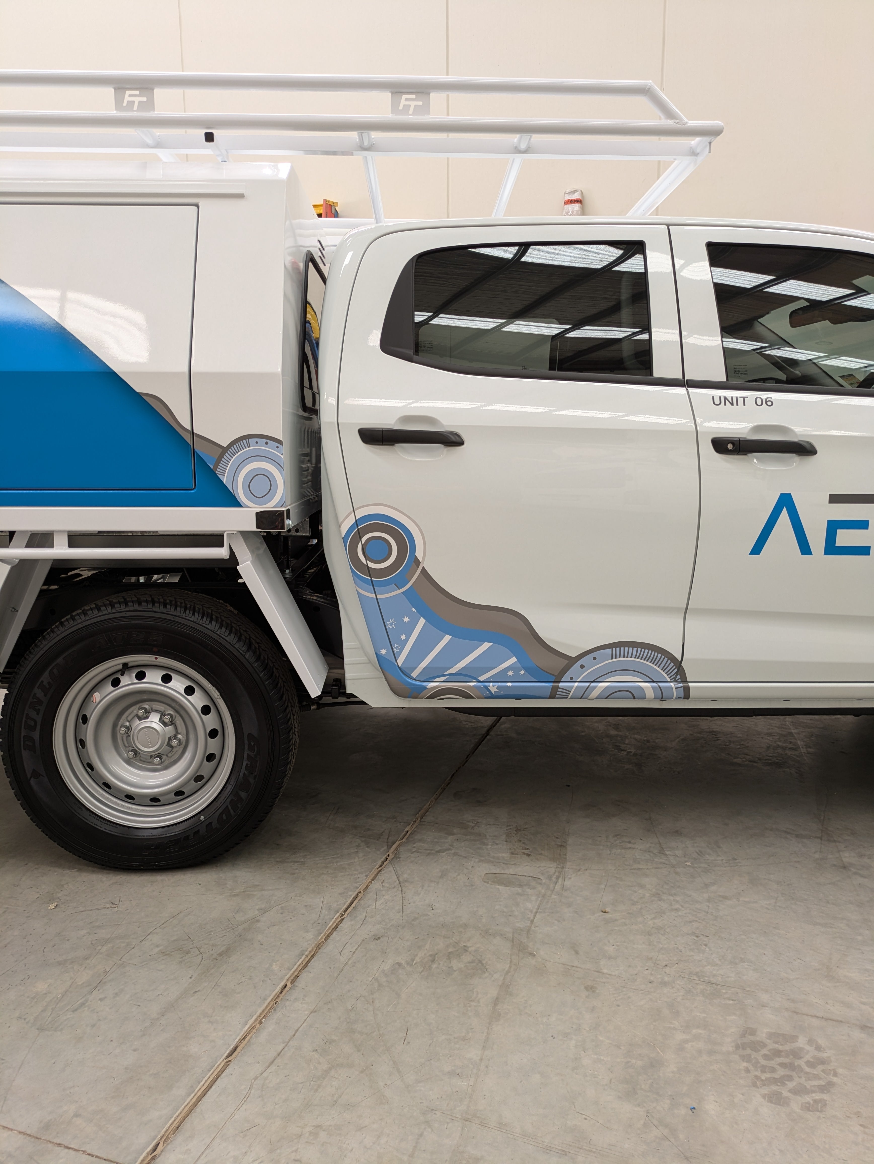 AEI_vehicle_wrap_side_detail_decal_on_ute_by_Saltwater_Sign_Co._8804dc7e-0e16-4acb-bf28-6b045123526f.jpg