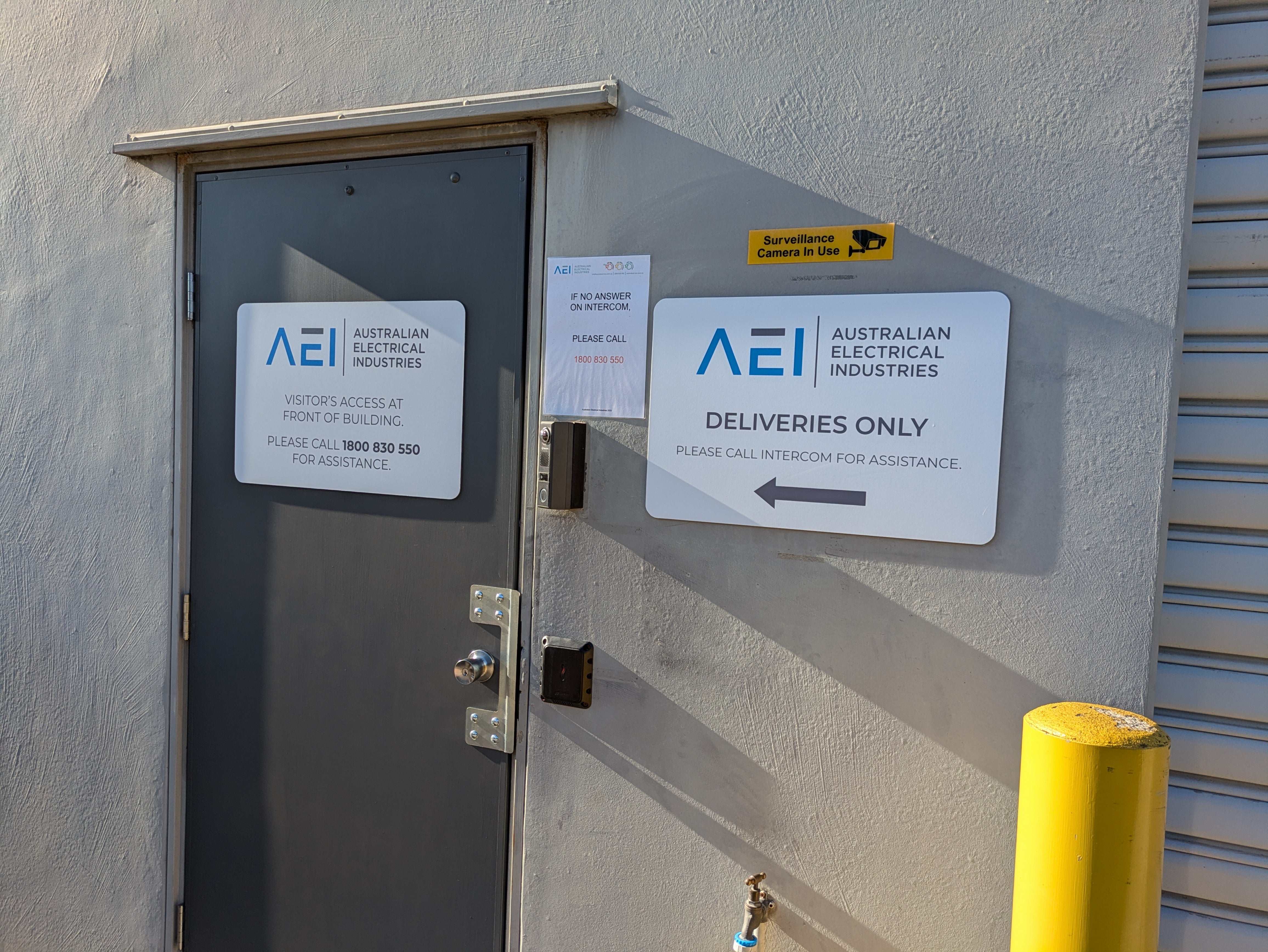 Australian Electrical Industries Factory Signage close up of door signage by Saltwater Sign Co.