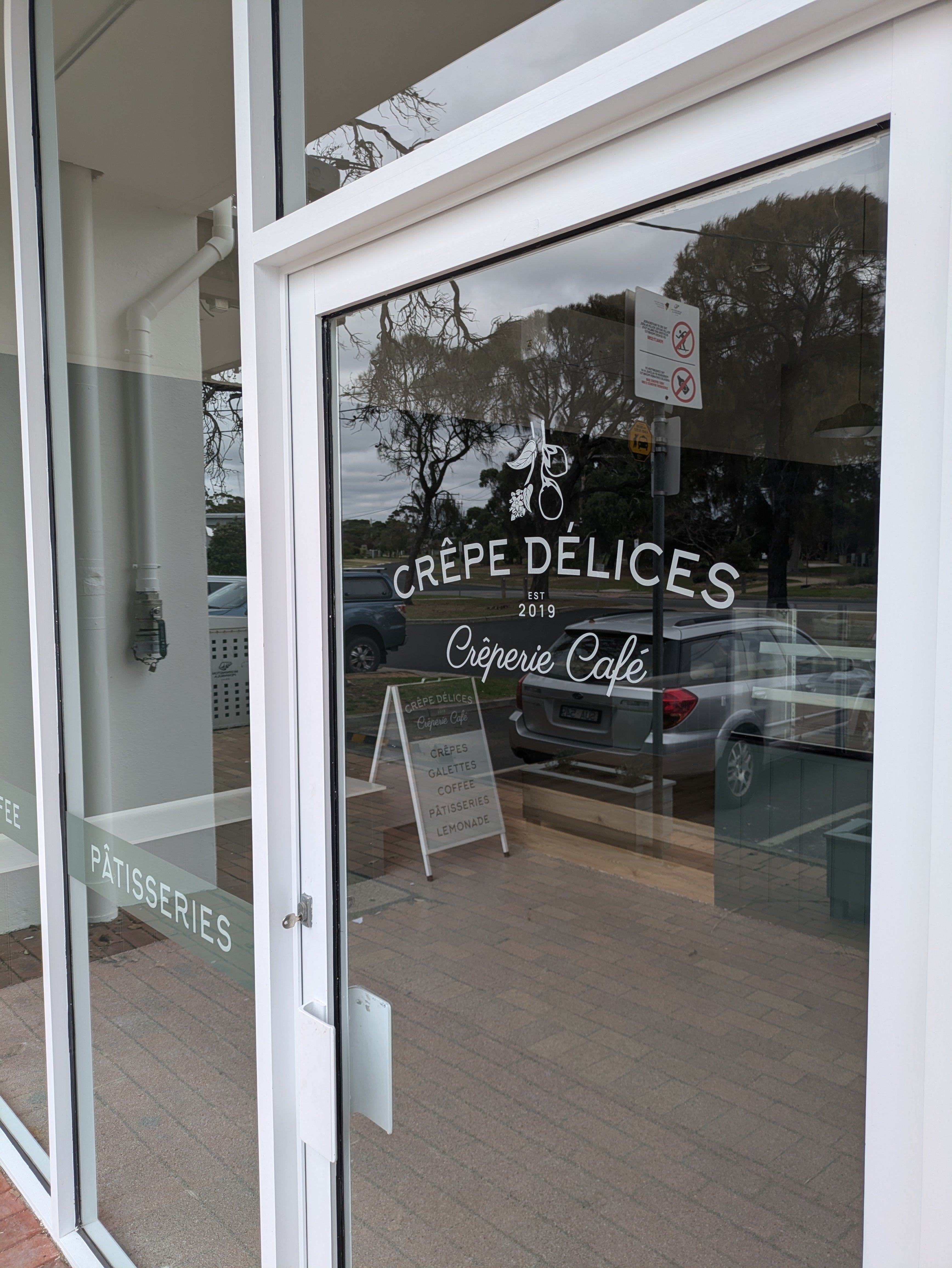 Crepe_Delices_Front_Door_Window_Decal_by_Saltwater_Sign_Co..jpg