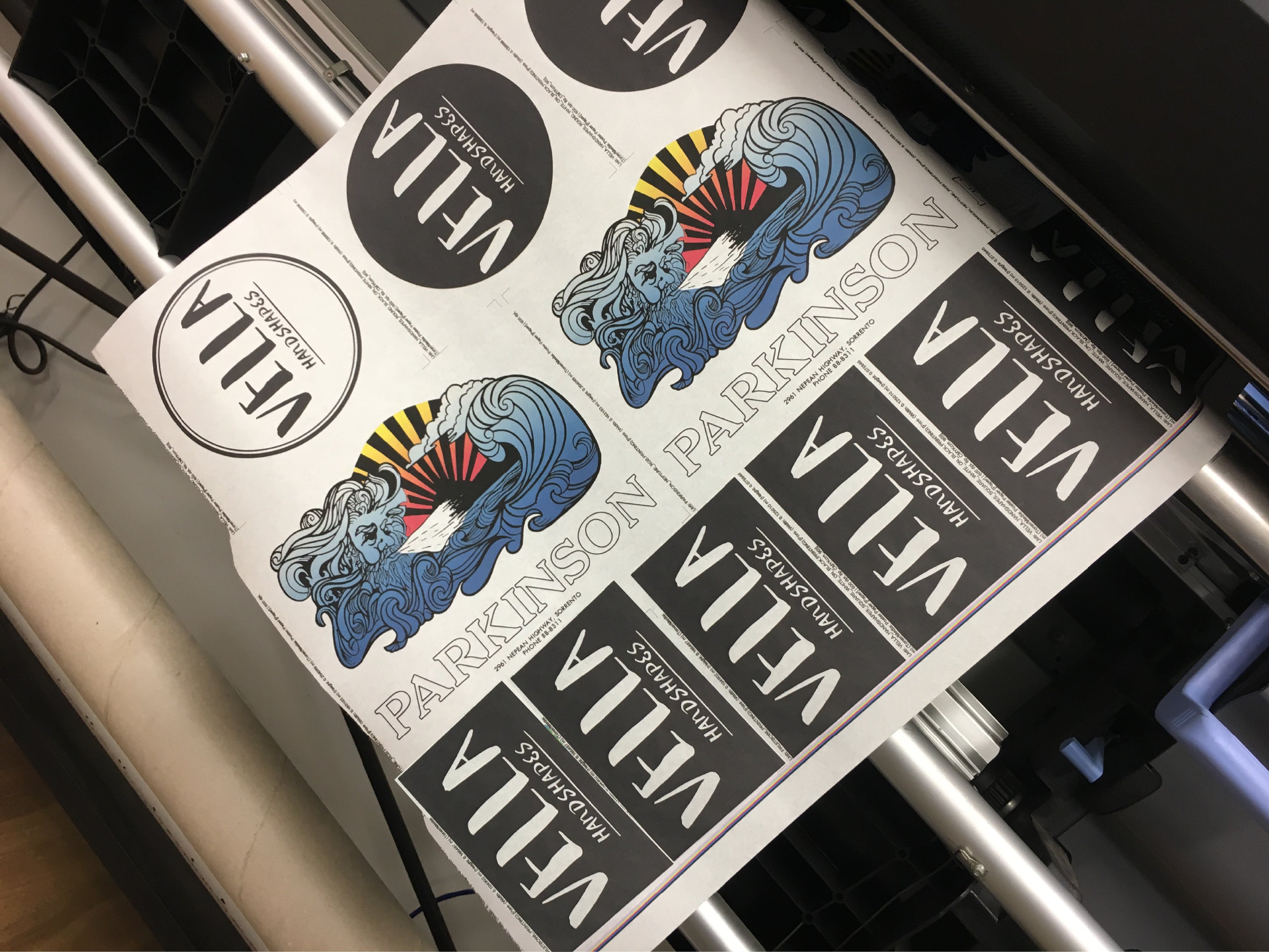 Stickers_being_printed_on_vinyl_from_printer_machine_by_Saltwater_Sign_Co._bc4d28d4-d719-45c9-80dc-ba5925c03e5c.jpg